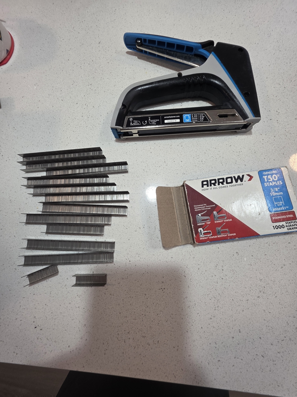 Arrow Staple Gun with Black and Blue Grip and T50 Staples